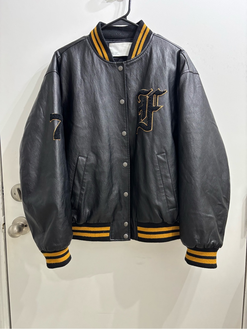 OAK + FORT Black Leather Varsity Jacket with Yellow Trim